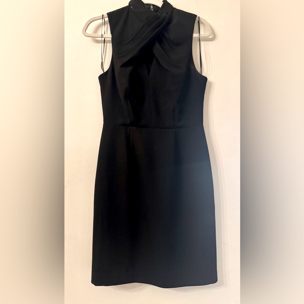 Trina Turk size 4 Elegant Black Sleeveless front PeepHole Dress